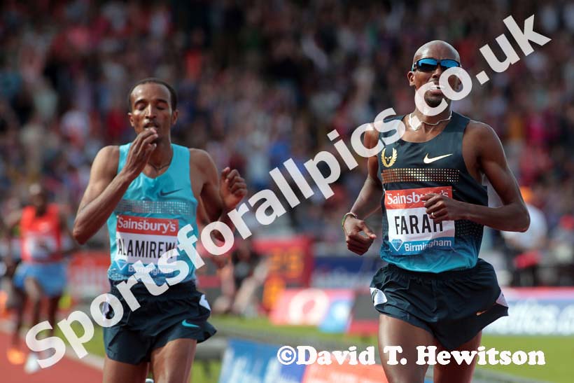 Mo Farah (GB) starts to celebrate after outsprinting Yenew Alamirew (Eith) in the 5000 metres at the IAAF Diamond League, Birmingham.
